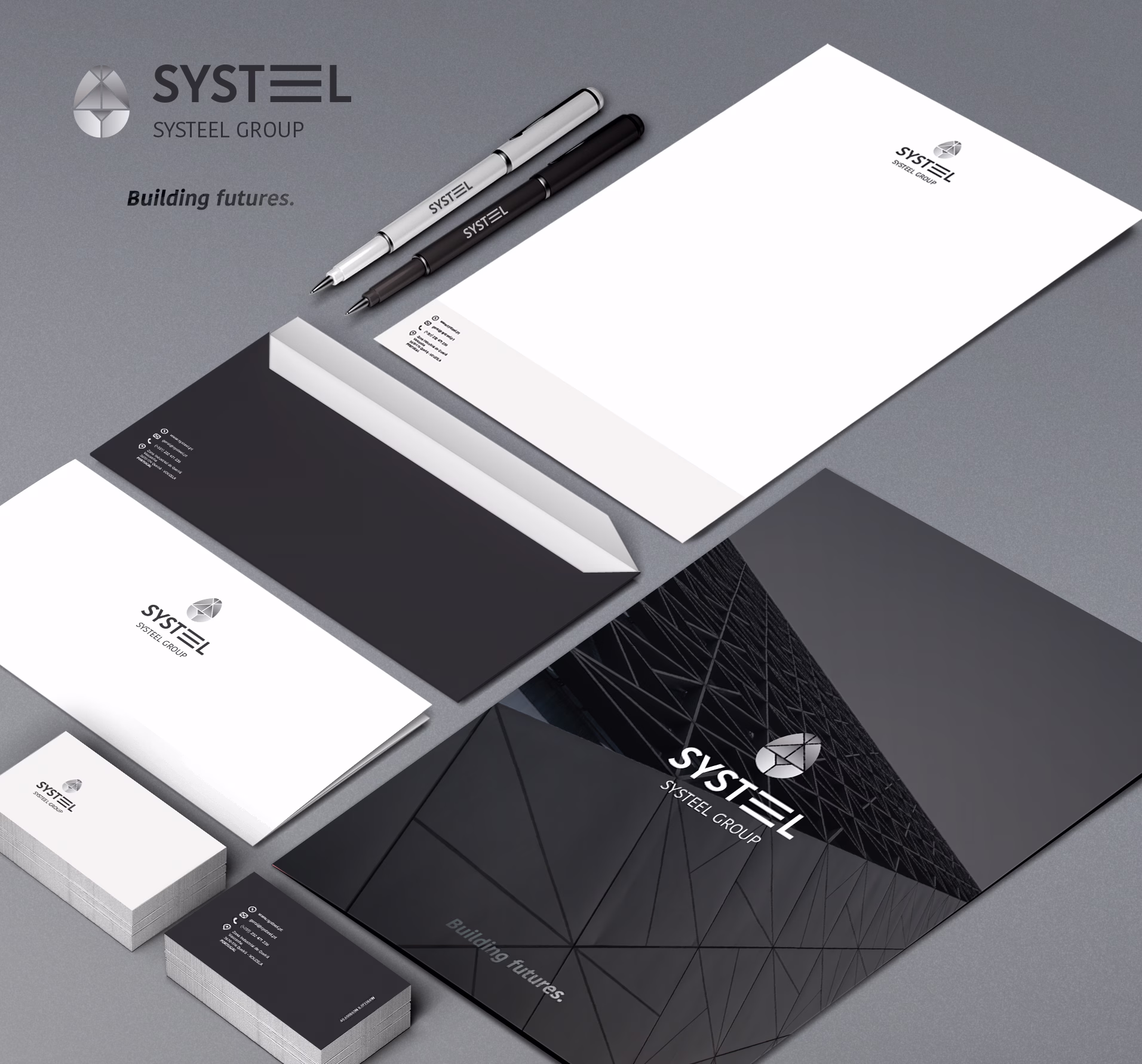 Systeel stationery with the tagline Building futures: letterhead, envelopes, business cards, folder and pens
